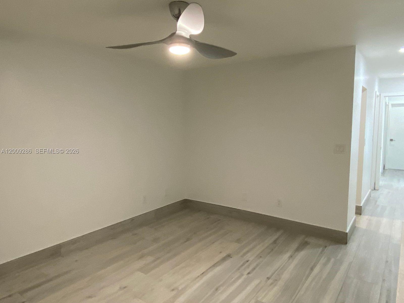 403 Southwest 89th Place Miami, FL 33174 - Photo 18 of 39 wooden floor in an empty room