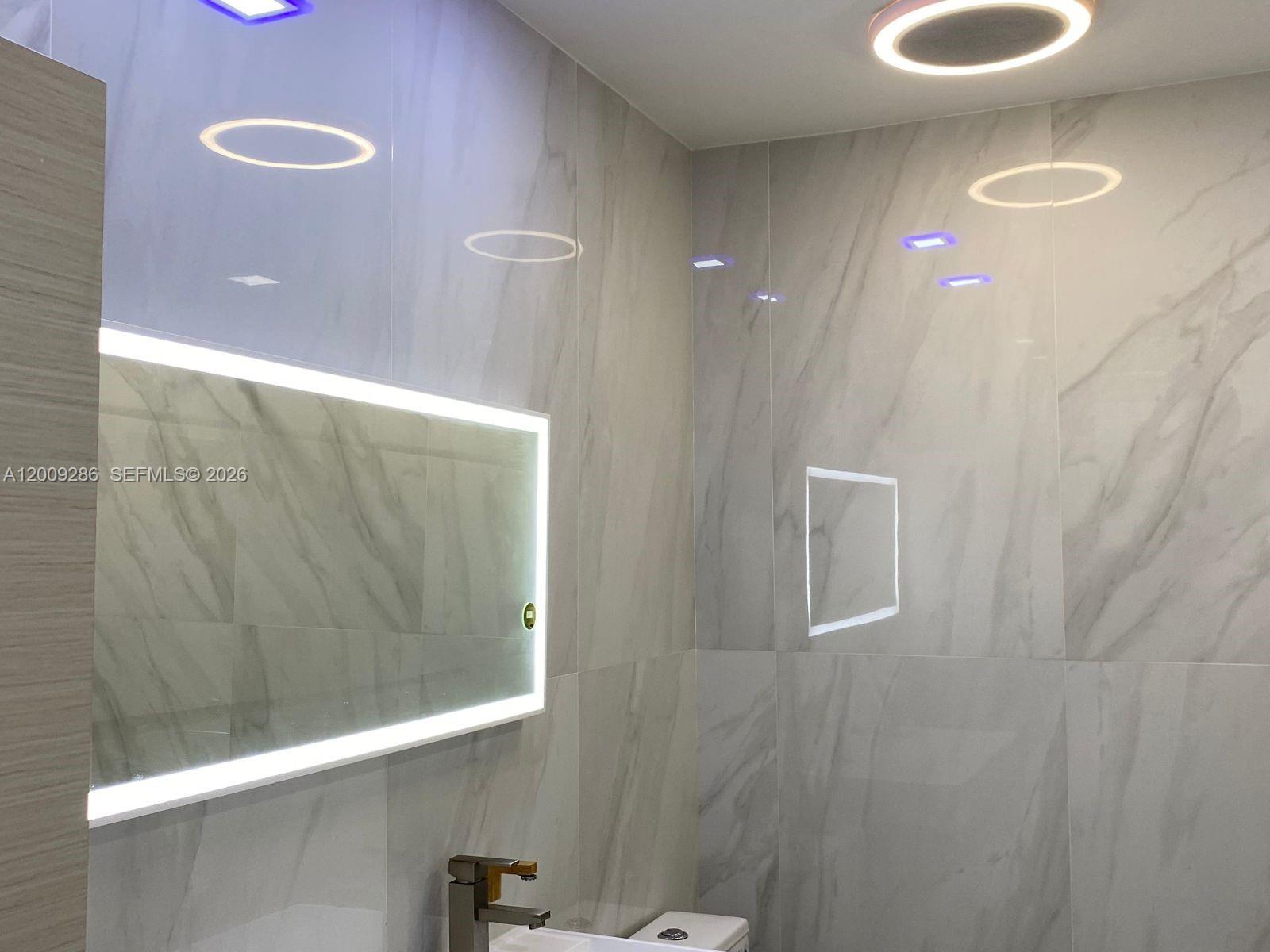 403 Southwest 89th Place Miami, FL 33174 - Photo 22 of 39 a bathroom with a shower