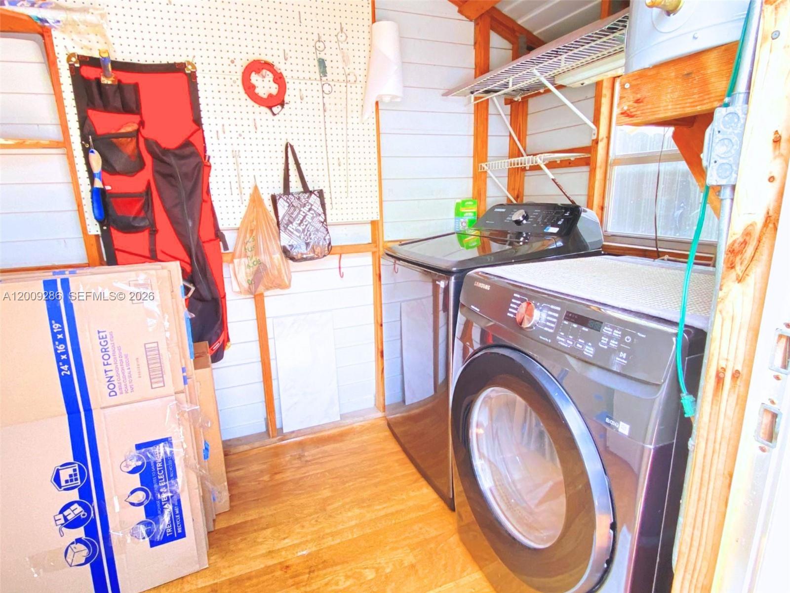 403 Southwest 89th Place Miami, FL 33174 - Photo 34 of 39 a utility room with a washer and dryer