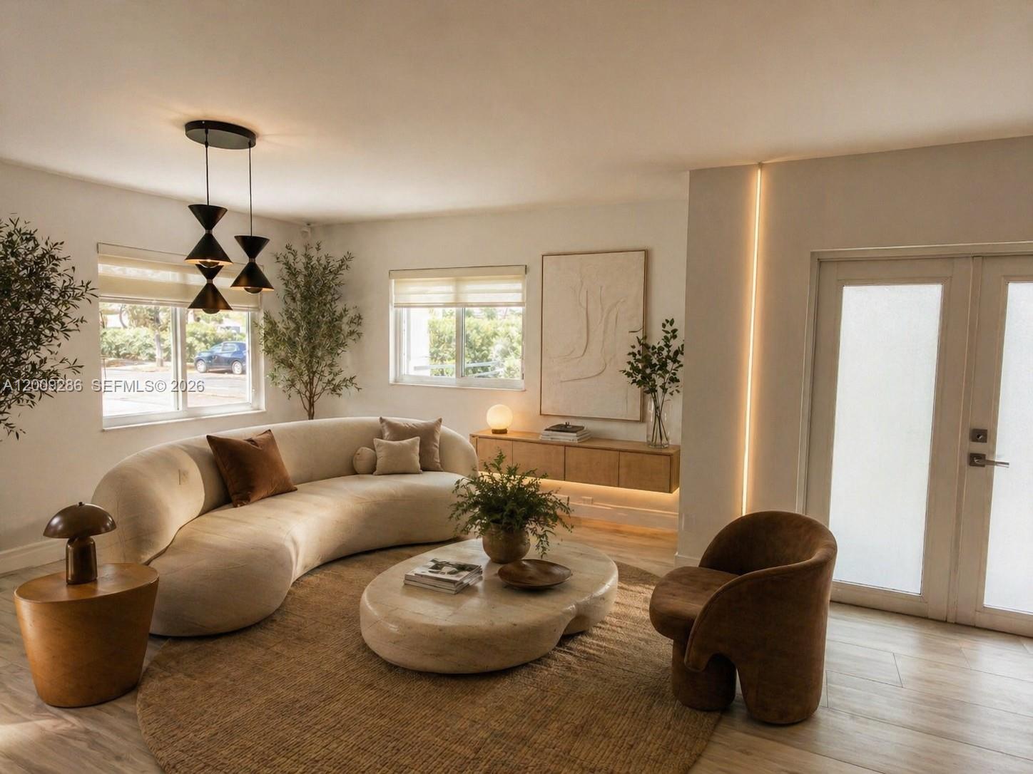 403 Southwest 89th Place Miami, FL 33174 - Photo 6 of 39 a living room with furniture and a potted plant