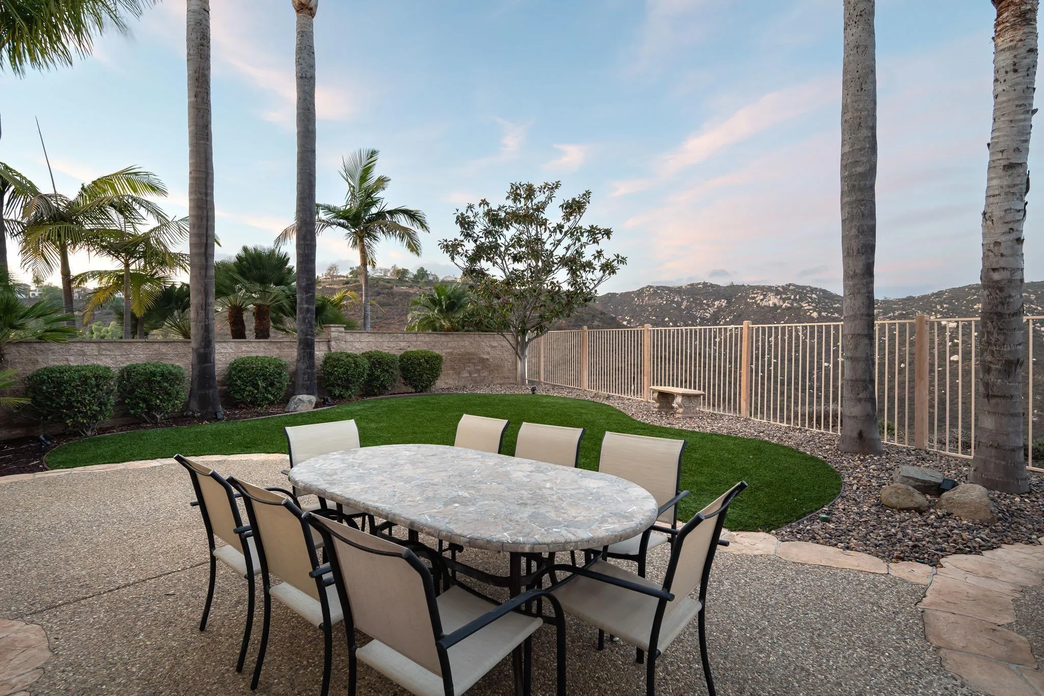 2104 View Crest Glen Escondido, CA 92026 - Photo 16 of 22 a view of a patio with a table chairs and a table
