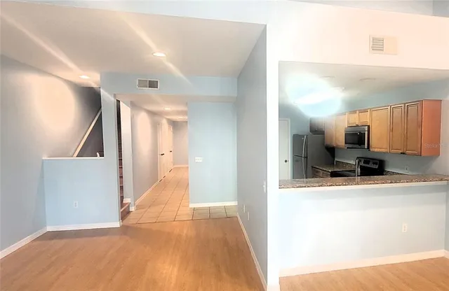 a view of a living room with a sink