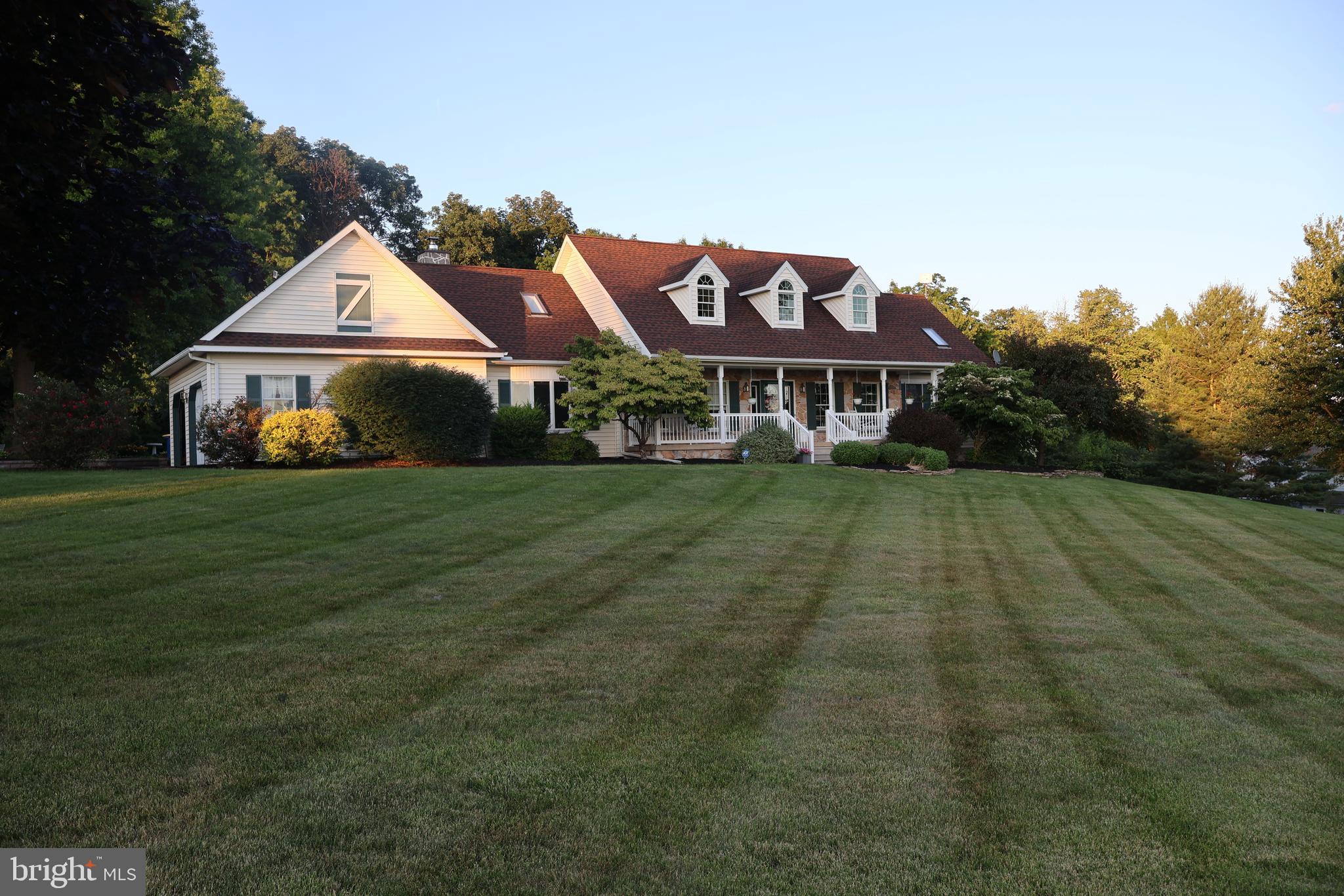 509 Buchland Road Narvon, PA 17555 - Photo 3 of 94 a front view of a house with a yard