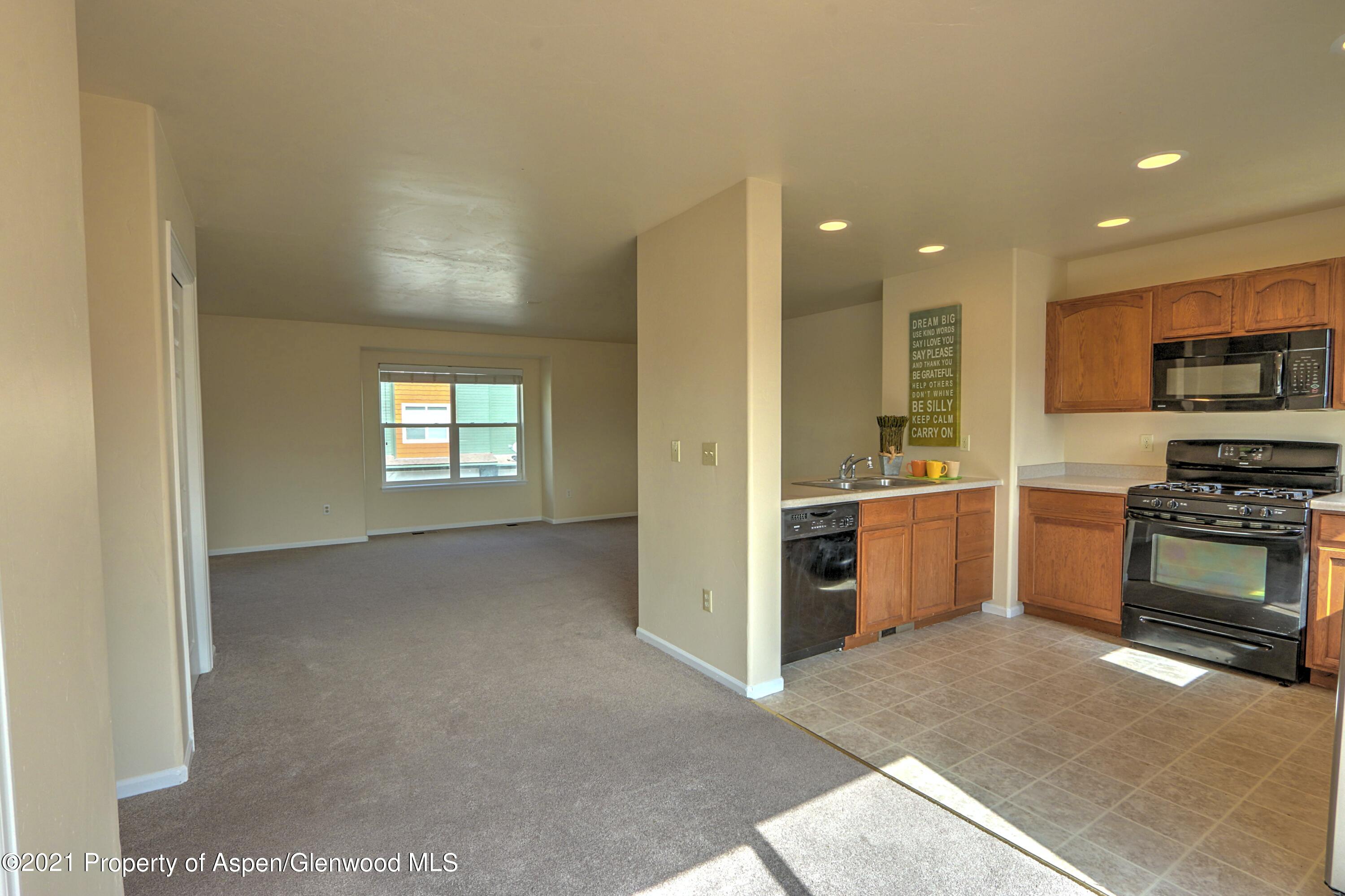 2443 Pine Lane Rifle, CO 81650 - Photo 6 of 20 kitchen-dining-living