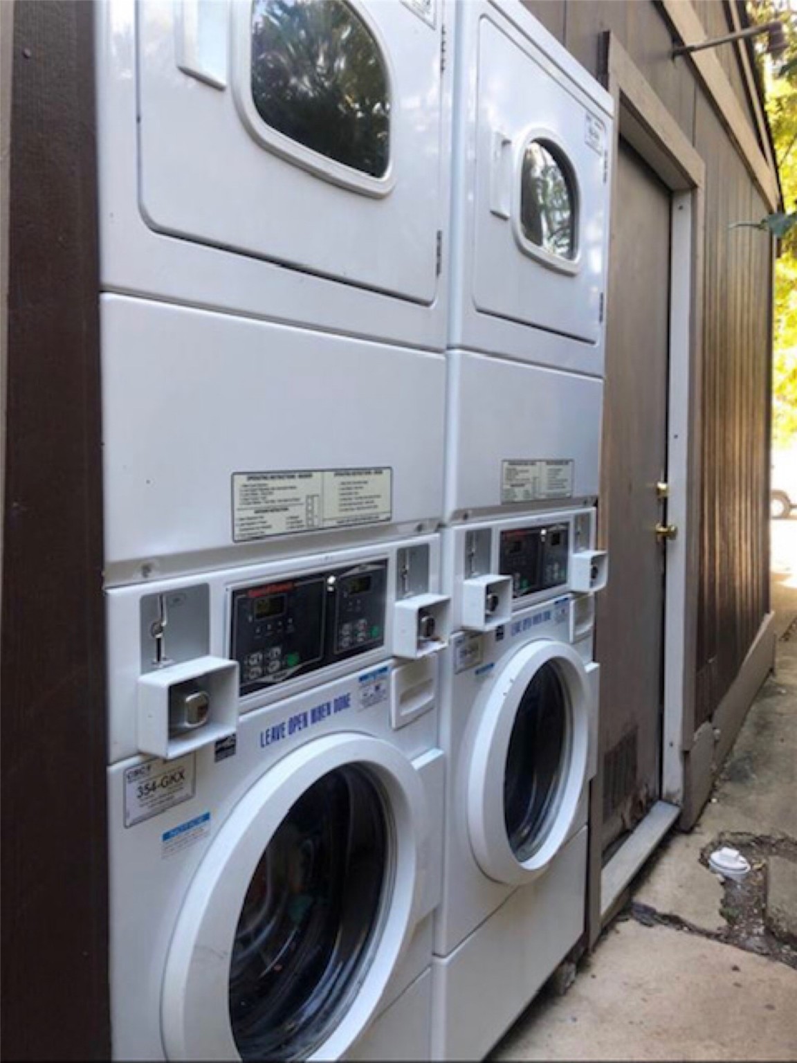 1756 West Main Street, Unit 22 Houston, TX 77098 - Photo 7 of 8 a utility room with dryer and washer