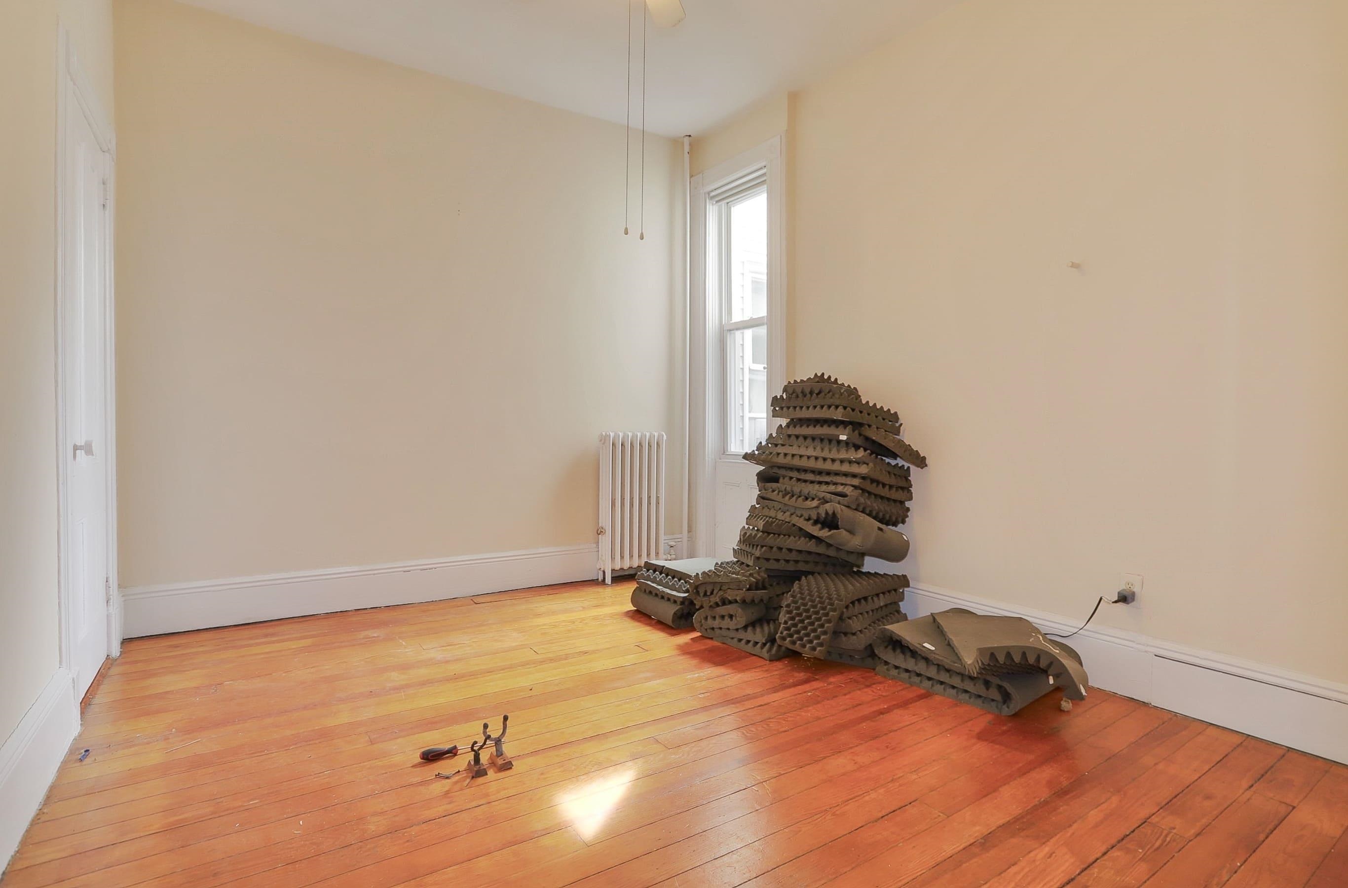 58 Prospect Street, Unit 2 Jersey City, NJ 07307 - Photo 13 of 26 a backyard of a house with wooden floor