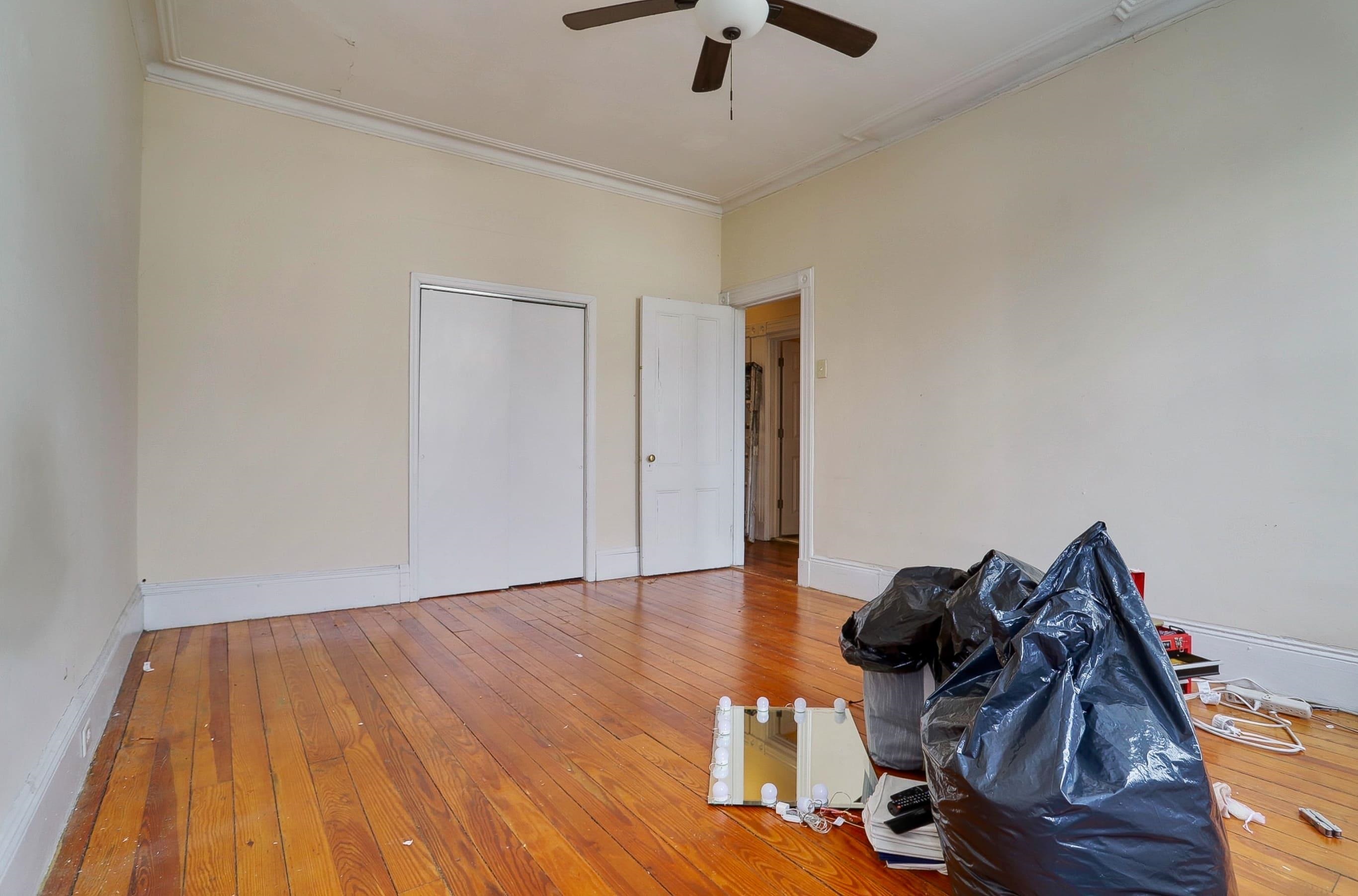 58 Prospect Street, Unit 2 Jersey City, NJ 07307 - Photo 14 of 26 a view of a room with wooden floor gym equipment