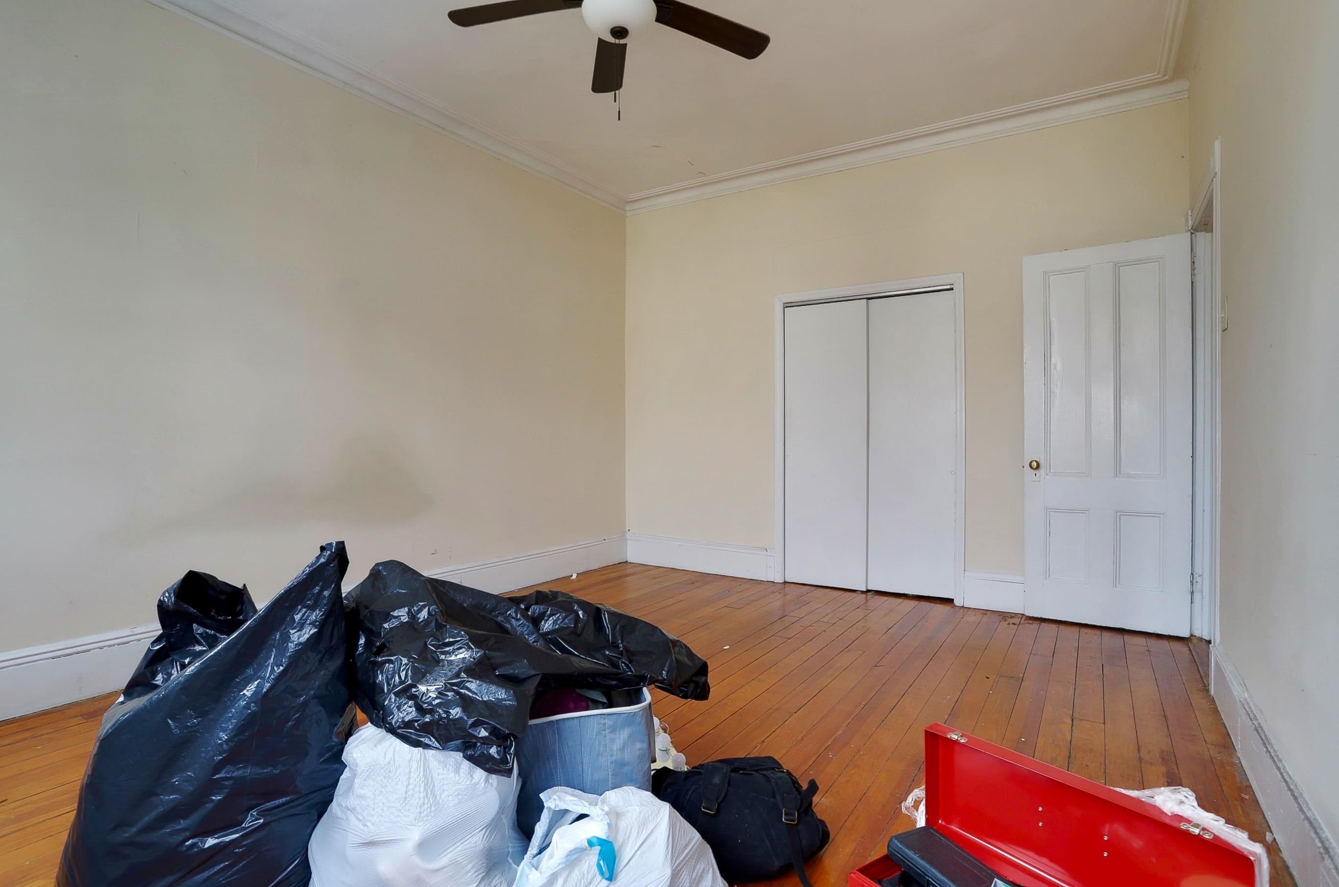 58 Prospect Street, Unit 2 Jersey City, NJ 07307 - Photo 15 of 26 a living room with furniture and a rug