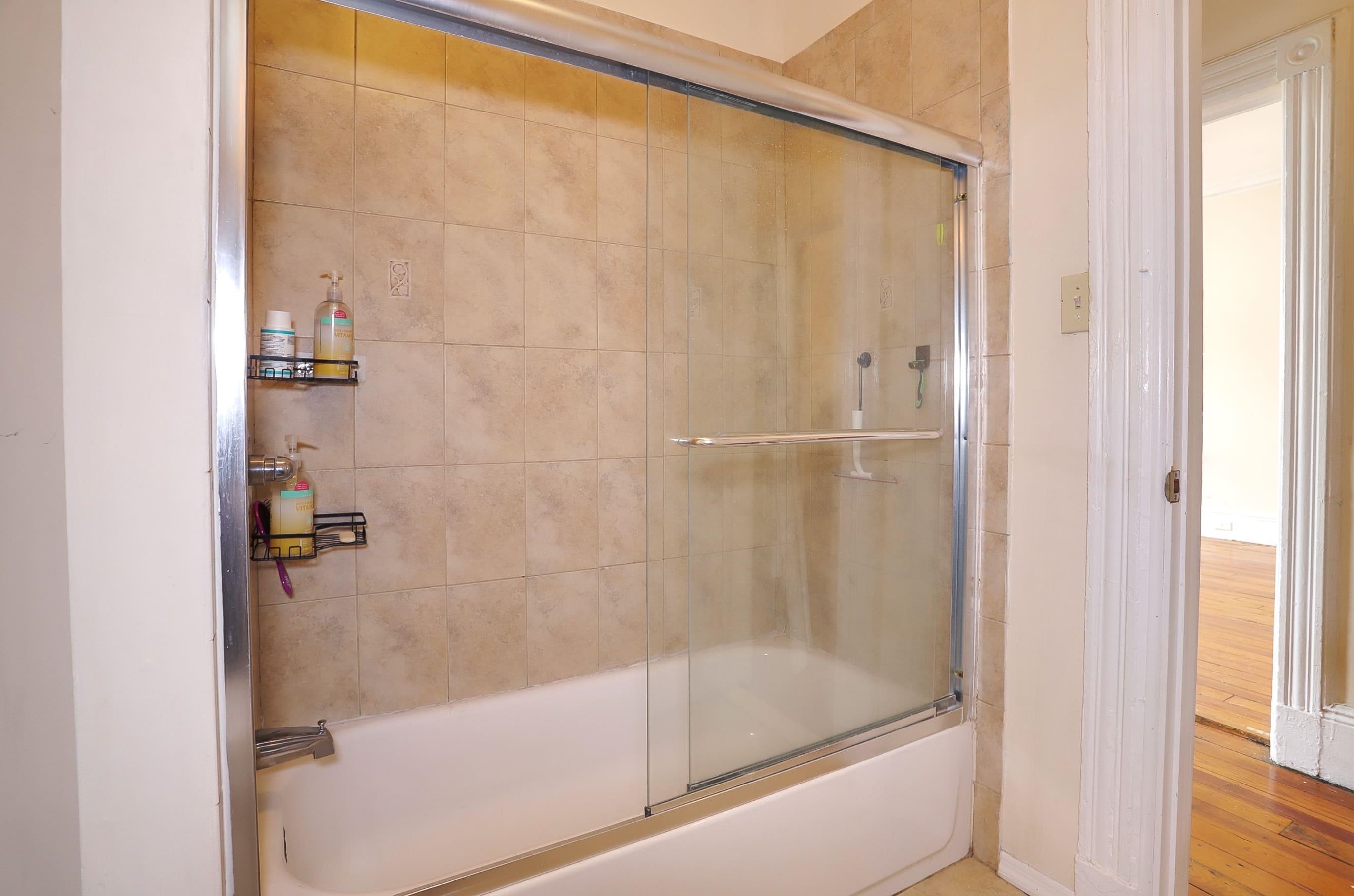 58 Prospect Street, Unit 2 Jersey City, NJ 07307 - Photo 16 of 26 a bathroom with a bathtub