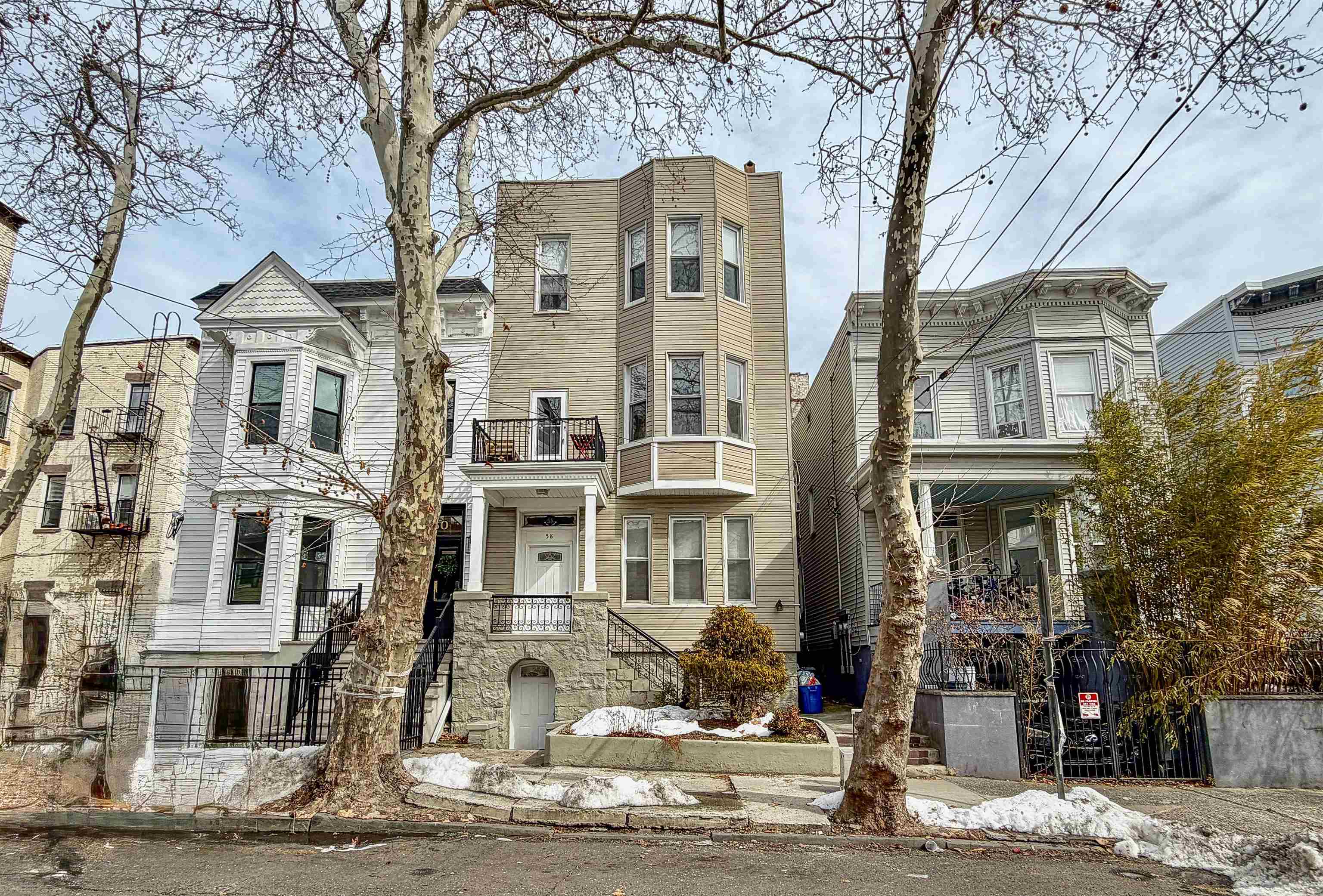 58 Prospect Street, Unit 2 Jersey City, NJ 07307 - Photo 18 of 26 a front view of a building with a street