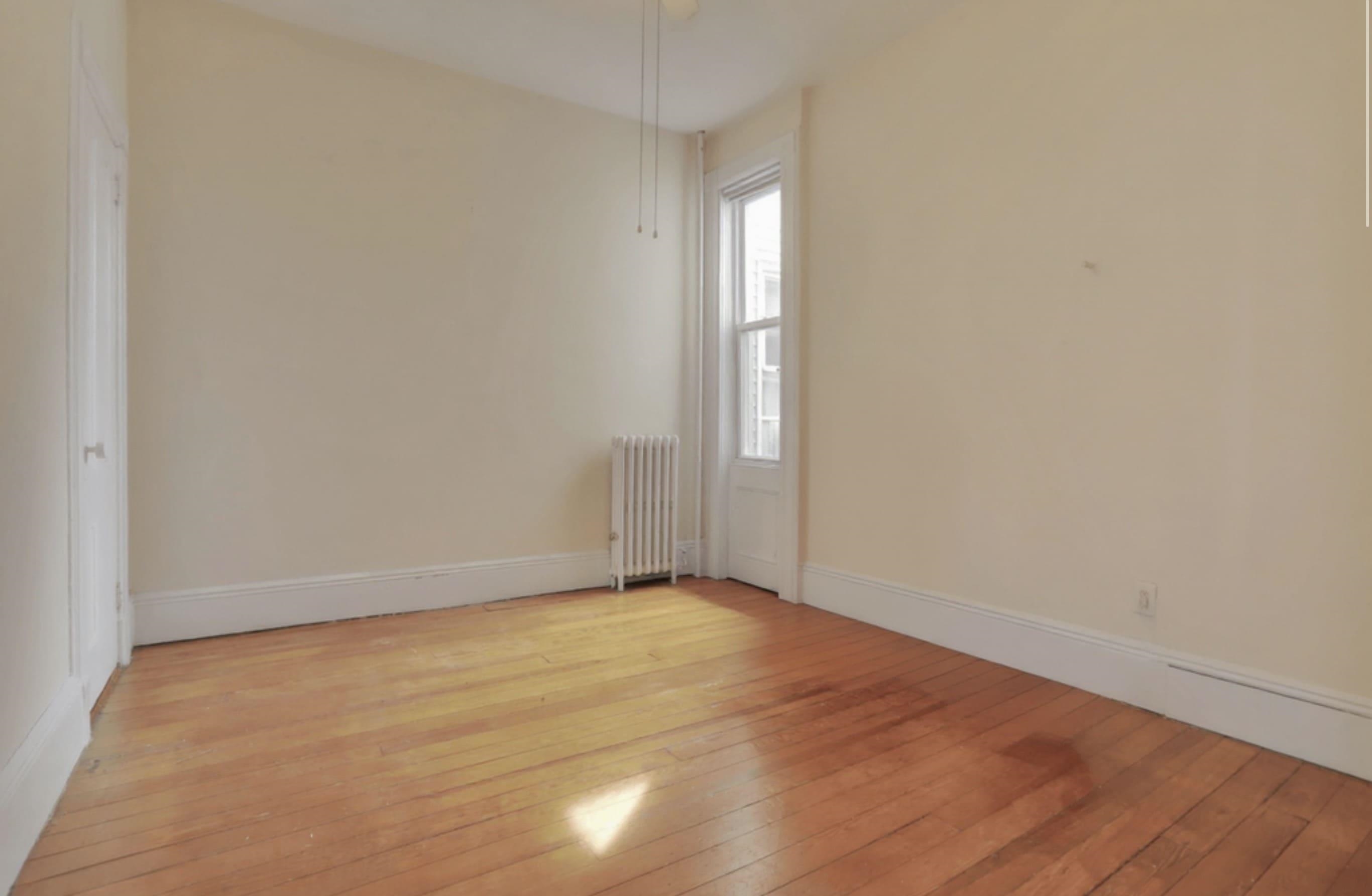 58 Prospect Street, Unit 2 Jersey City, NJ 07307 - Photo 22 of 26 a view of an empty room and wooden floor
