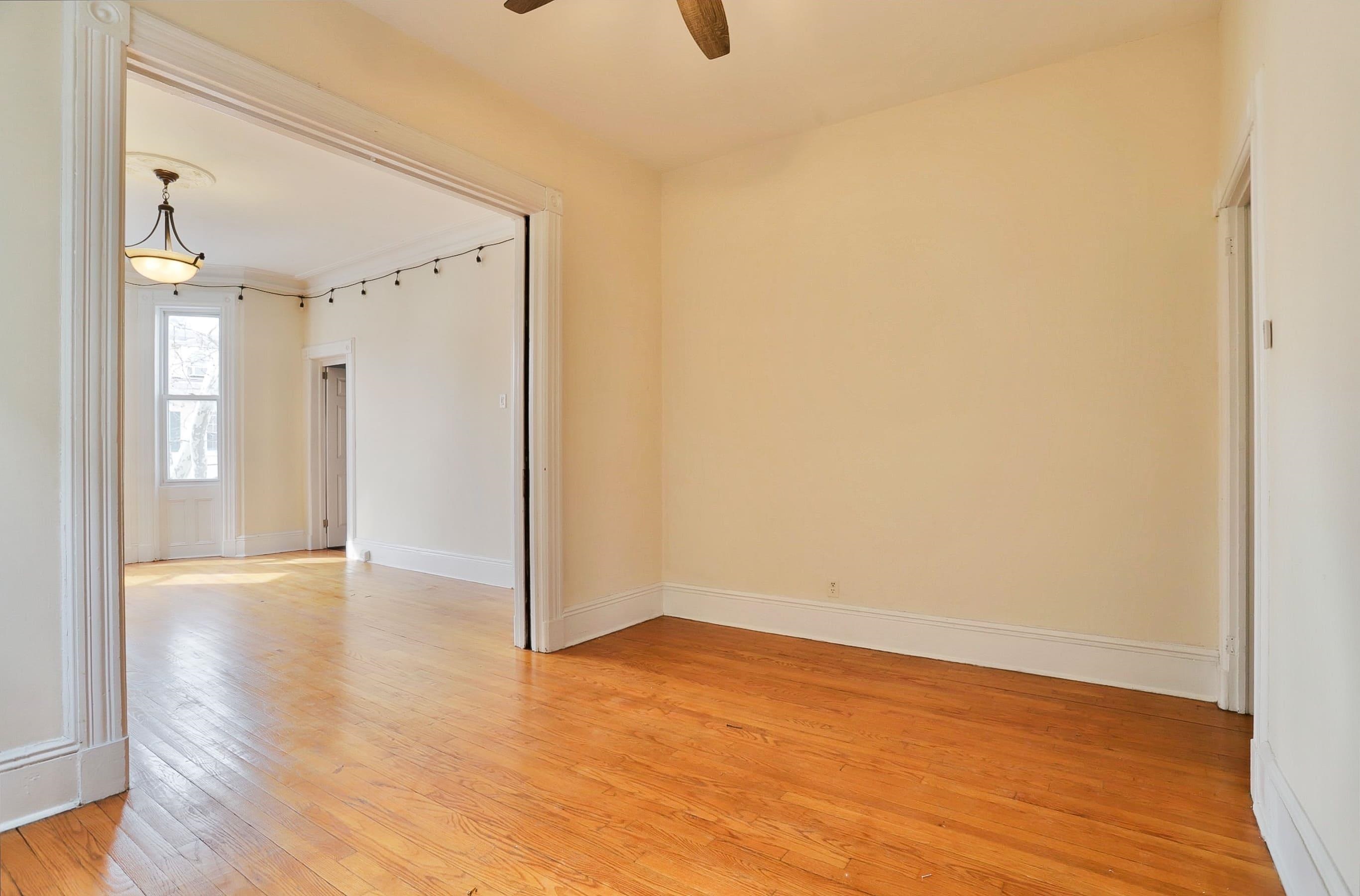 58 Prospect Street, Unit 2 Jersey City, NJ 07307 - Photo 10 of 26 a view of an empty room with wooden floor