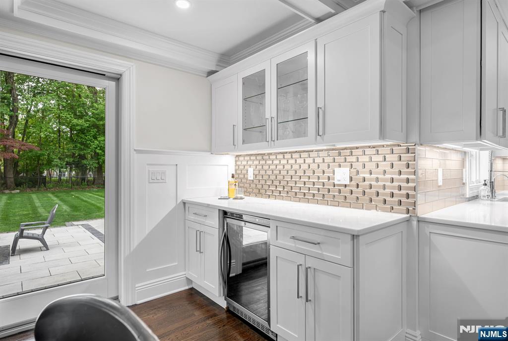 267 Merlin Place Wyckoff, NJ 07481 - Photo 18 of 49 a kitchen with a sink and a large window