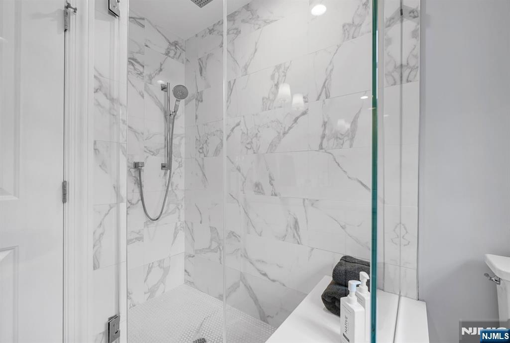 267 Merlin Place Wyckoff, NJ 07481 - Photo 32 of 49 a bathroom with a shower
