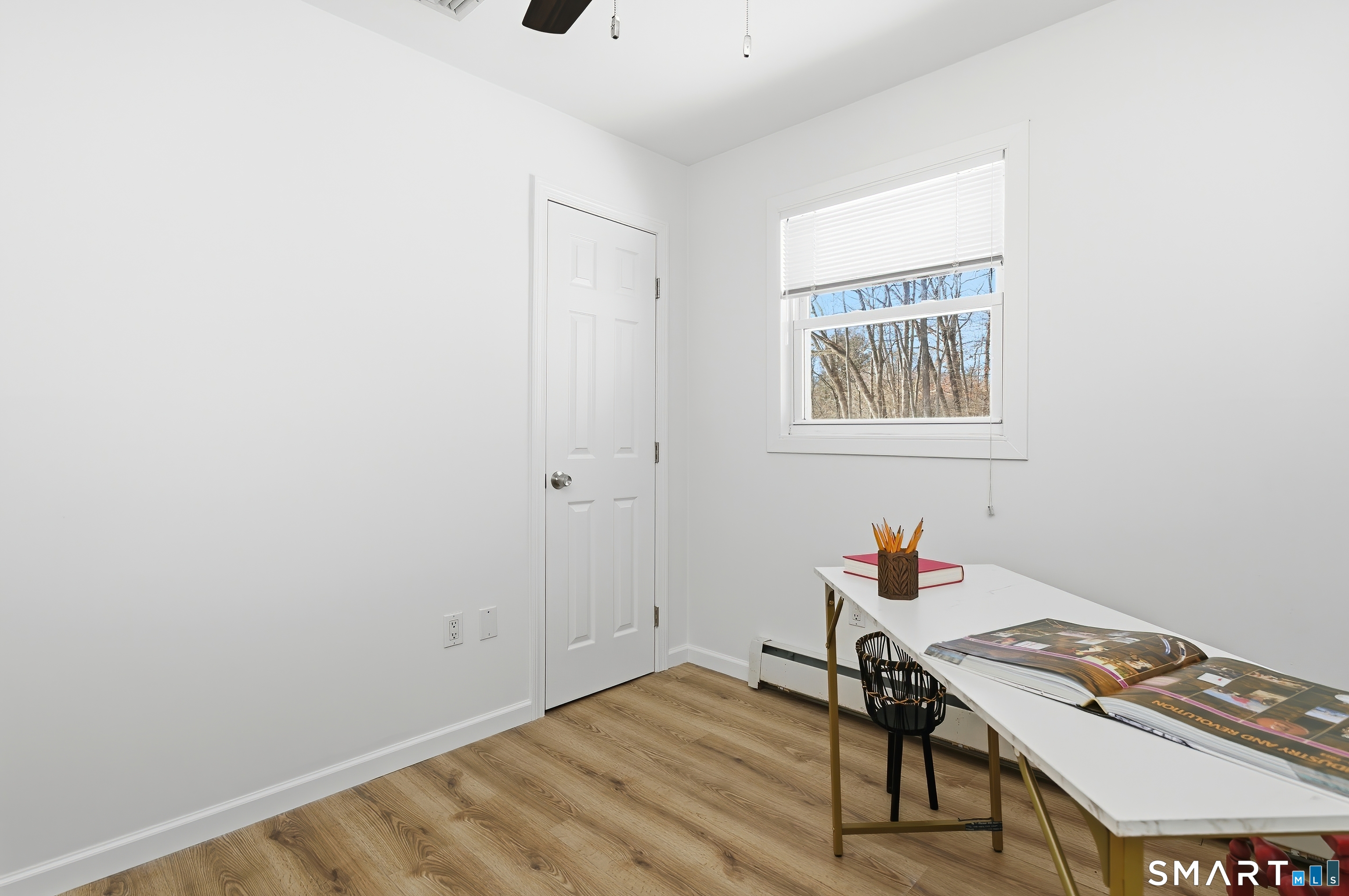 23 Ridgefield Road Wallingford, CT 06492 - Photo 15 of 28 a workspace with furniture and wooden floor