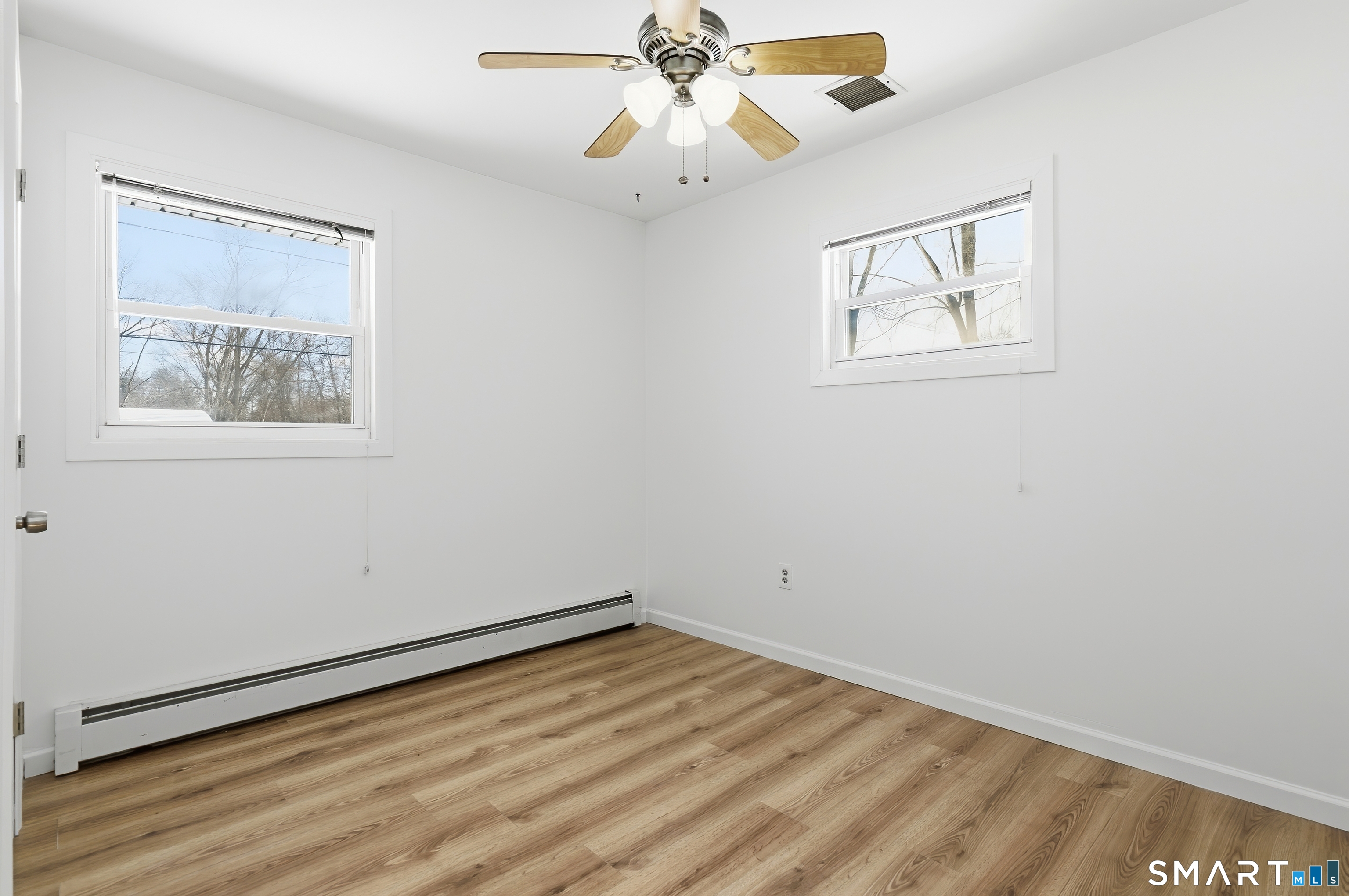 23 Ridgefield Road Wallingford, CT 06492 - Photo 20 of 28 a view of empty room with wooden floor