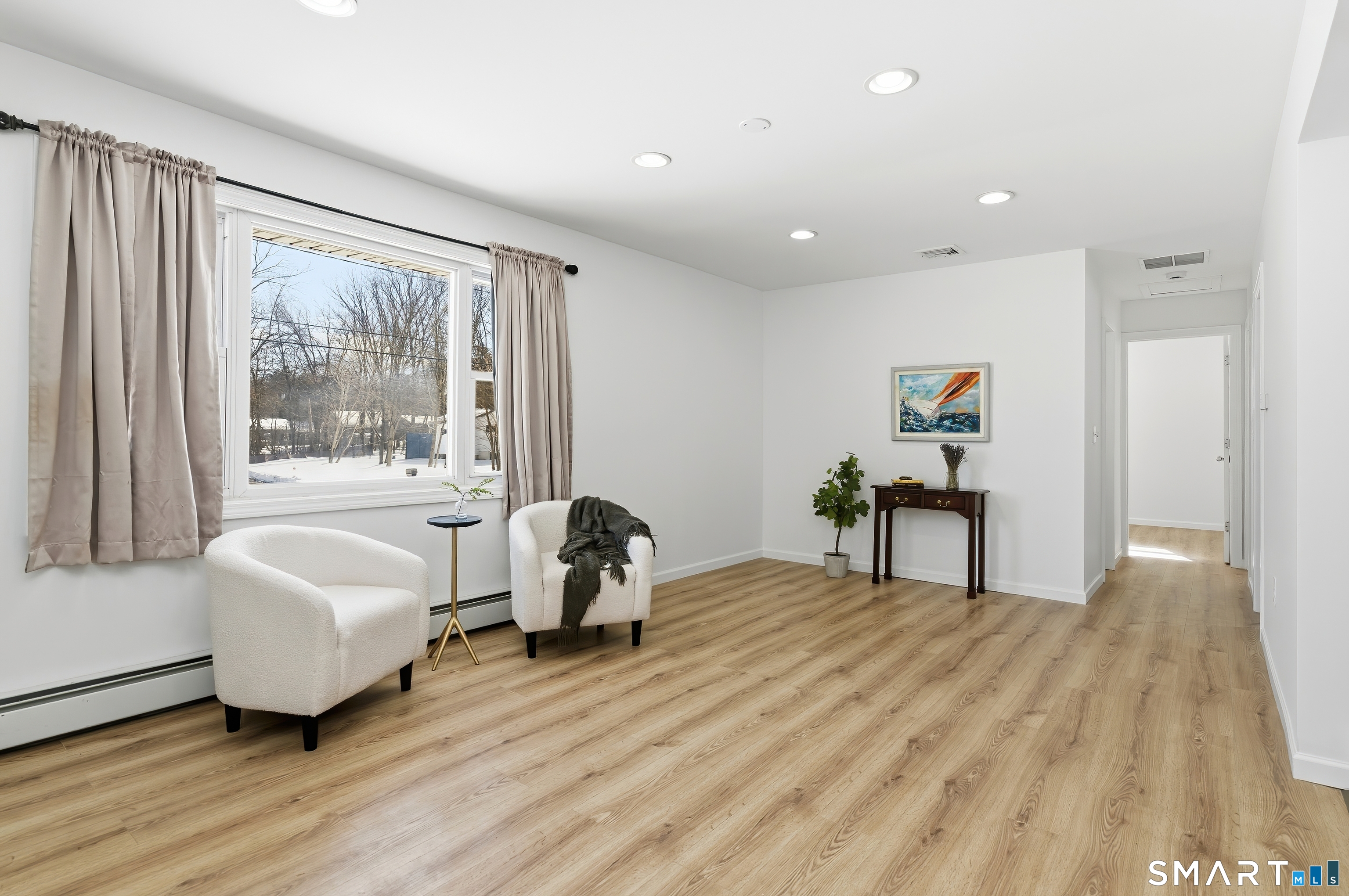 23 Ridgefield Road Wallingford, CT 06492 - Photo 8 of 28 a living room with furniture and a window