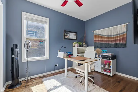 a workspace with furniture and window