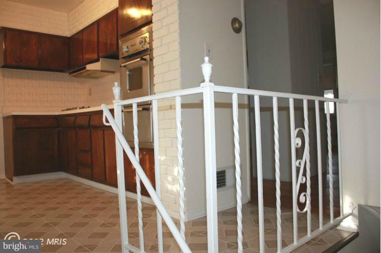 210 Cove Road Essex, MD 21221 - Photo 8 of 11 a view of a staircase