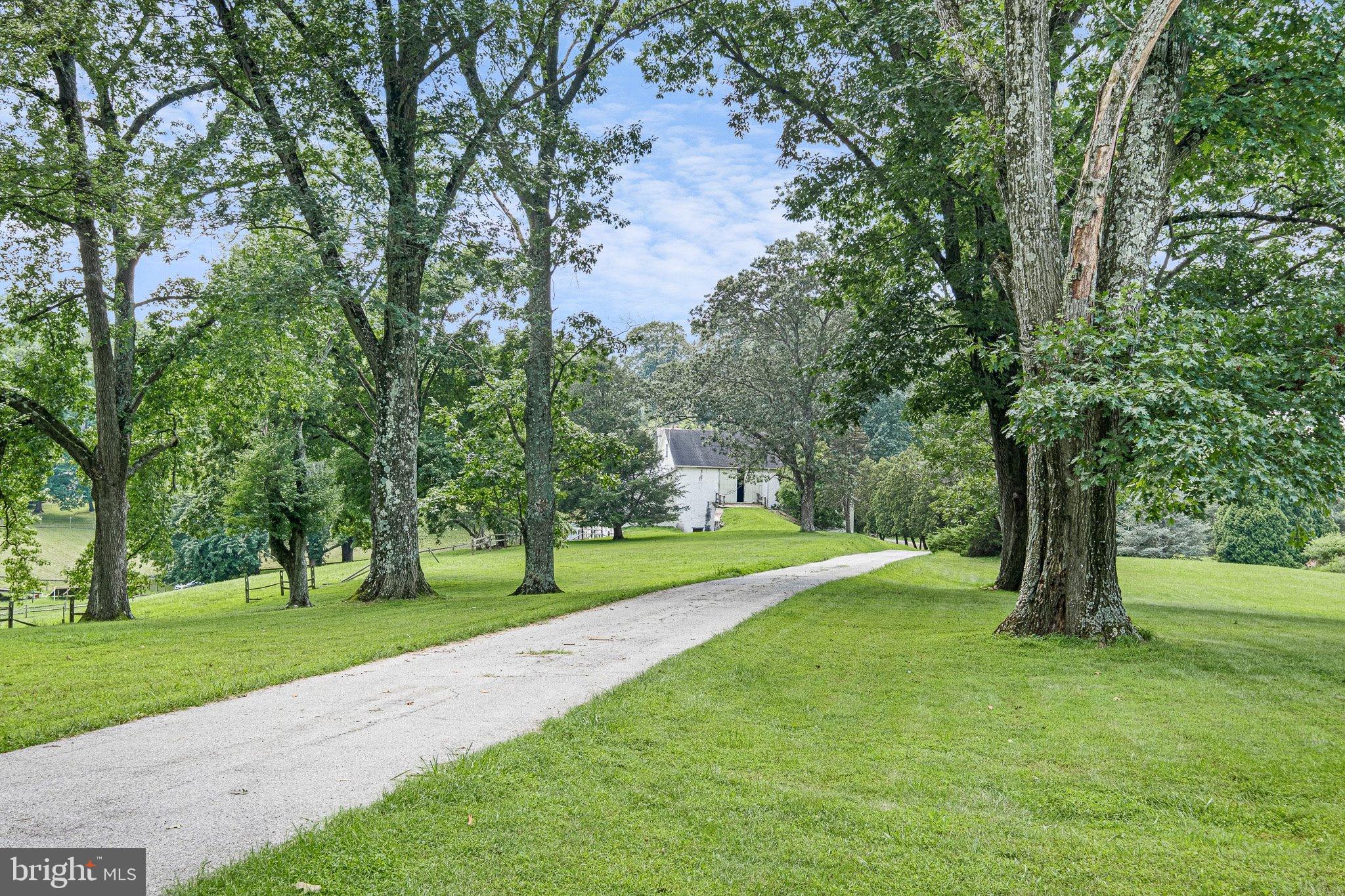 121 Gun Club Road Hockessin, DE 19707 - Photo 20 of 20 a green field with lots of trees
