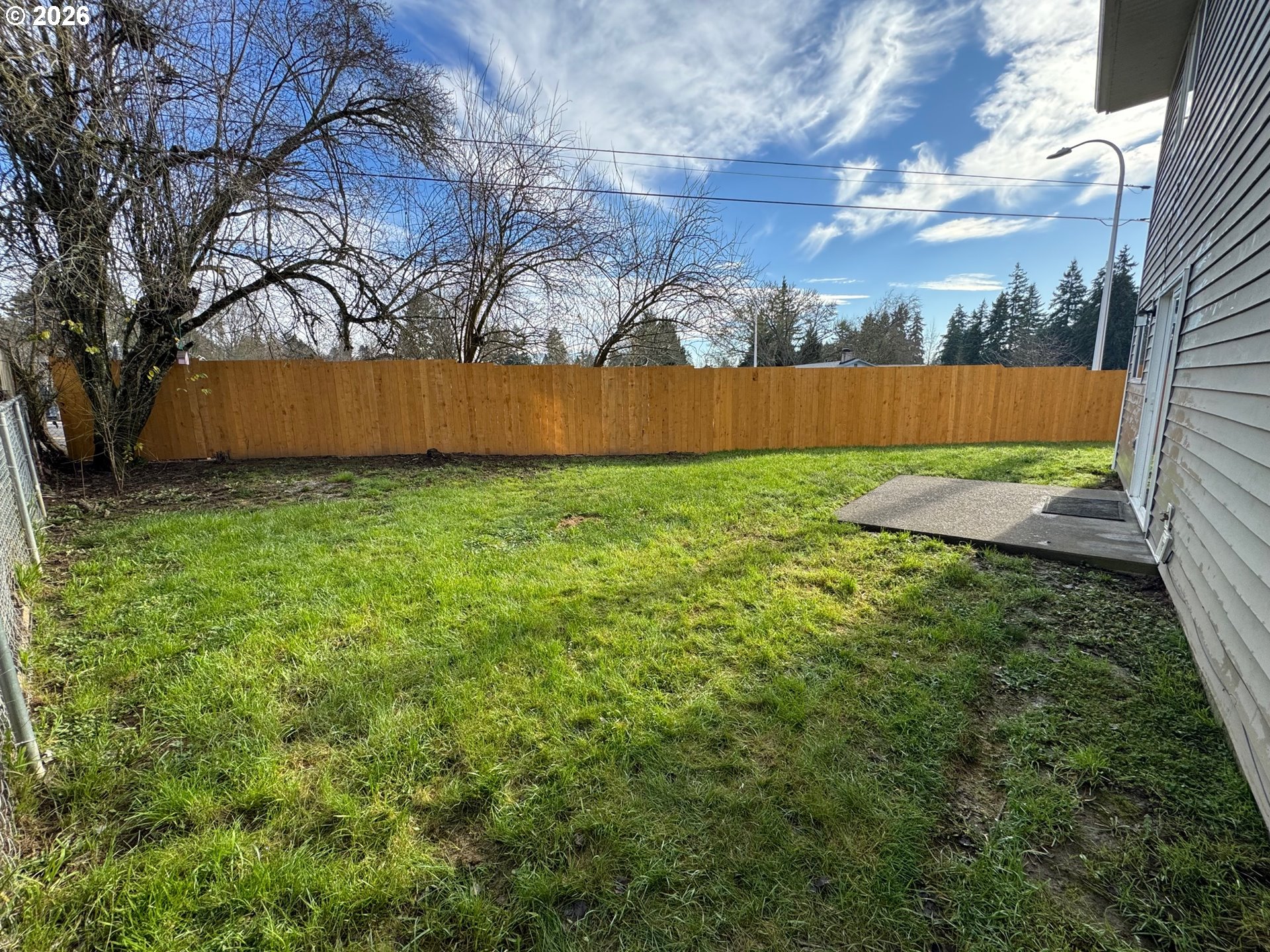 19901 Southwest Meadowbrook Court Beaverton, OR 97078 - Photo 13 of 23 a view of yard with swimming pool and green space