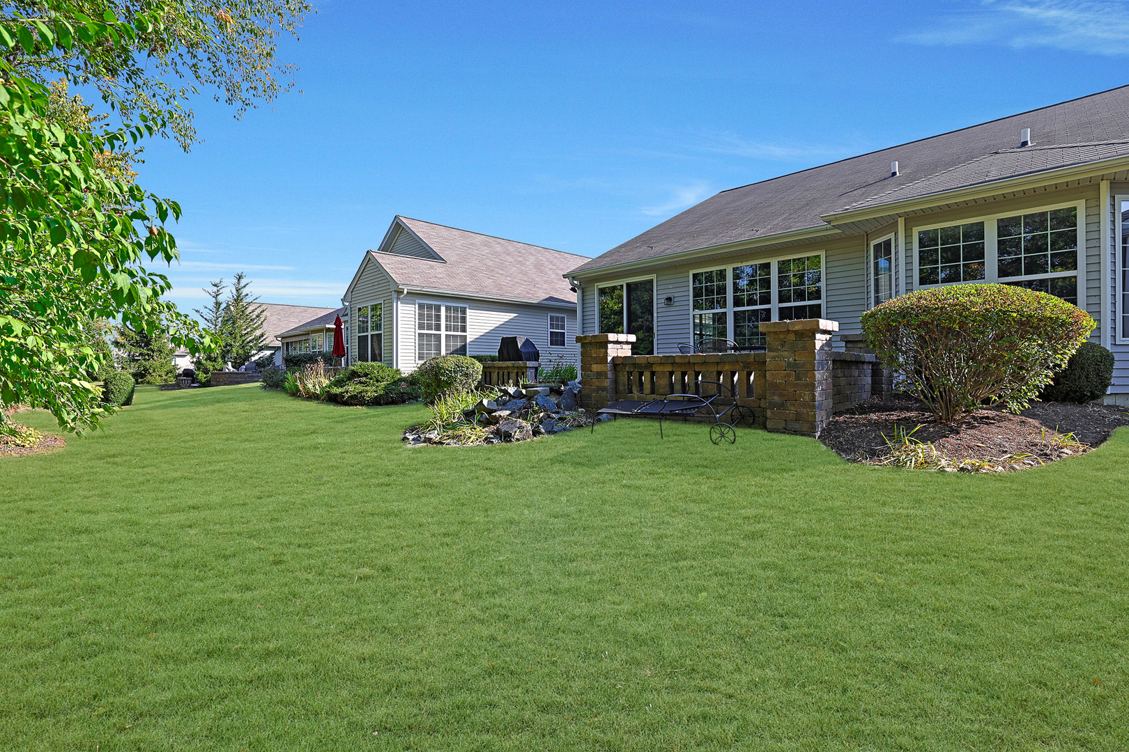 12669 Meritage Court Huntley, IL 60142 - Photo 27 of 33 a house view with a garden space