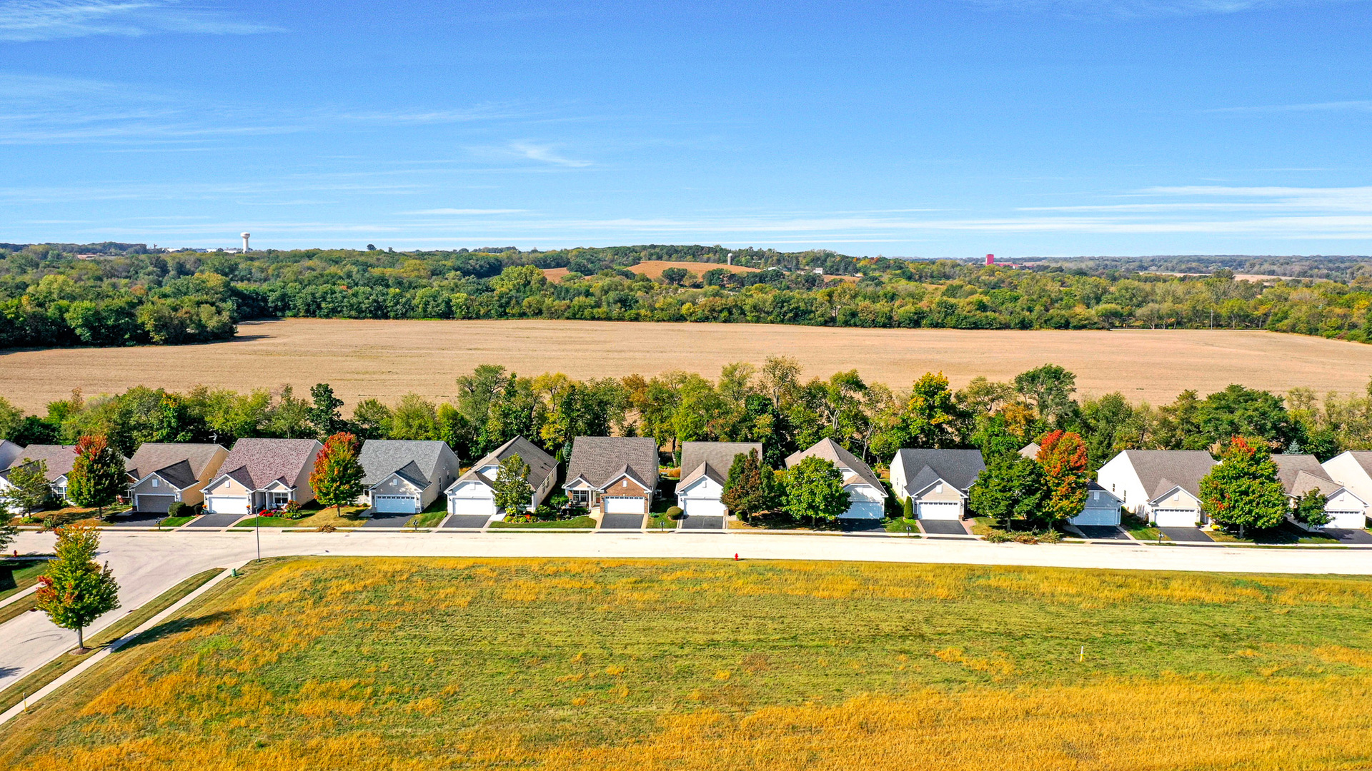 12669 Meritage Court Huntley, IL 60142 - Photo 32 of 33 a view of a lake with a outdoor space
