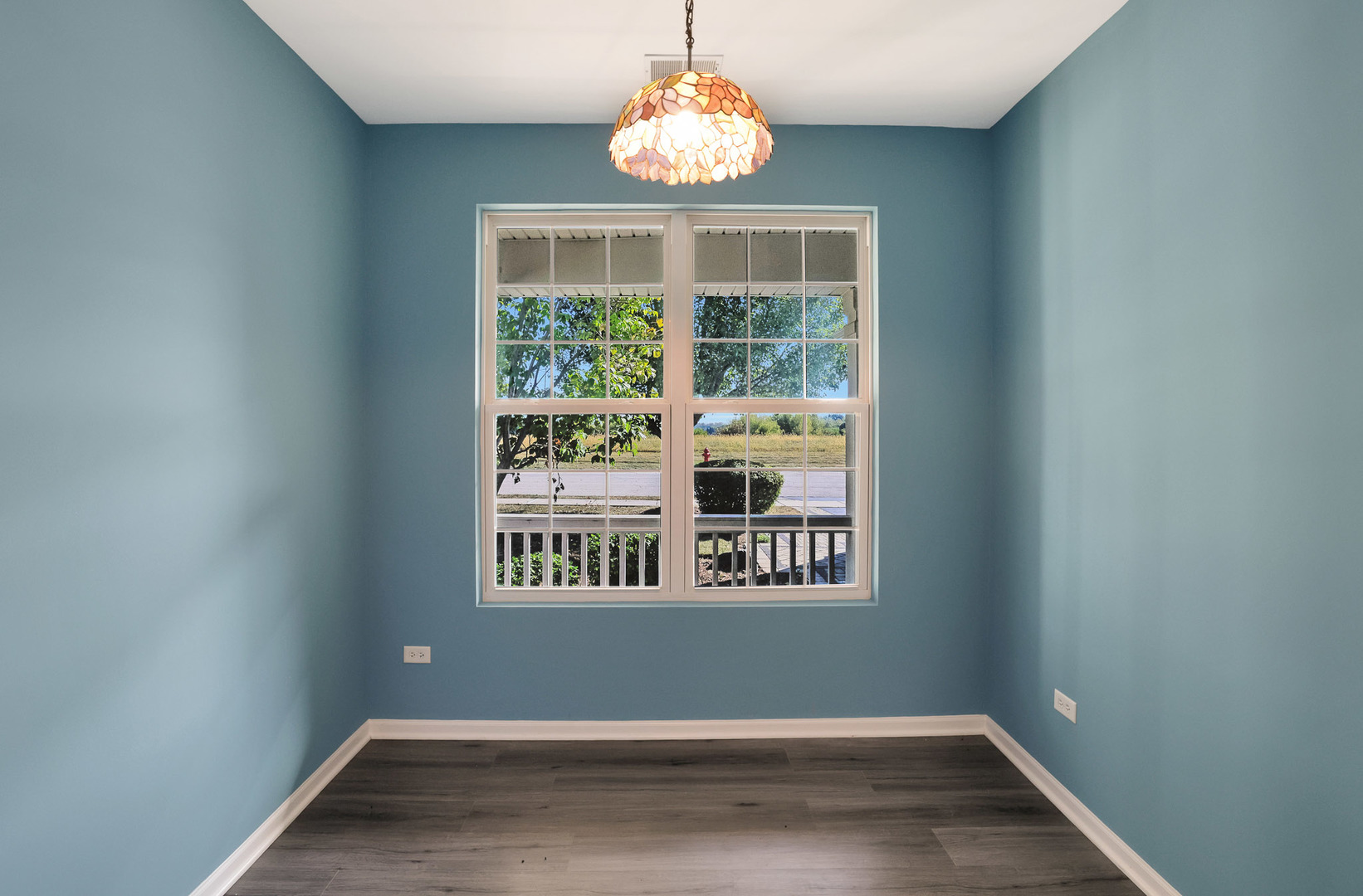 12669 Meritage Court Huntley, IL 60142 - Photo 6 of 33 a window in an empty room