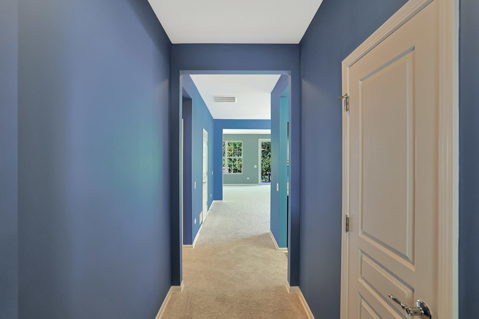 12669 Meritage Court Huntley, IL 60142 - Photo 7 of 33 a view of a hallway with wooden floor