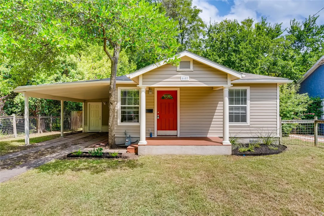 4609 Avenue D Austin, TX 78751 - Photo 1 of 1 a front view of a house with a yard