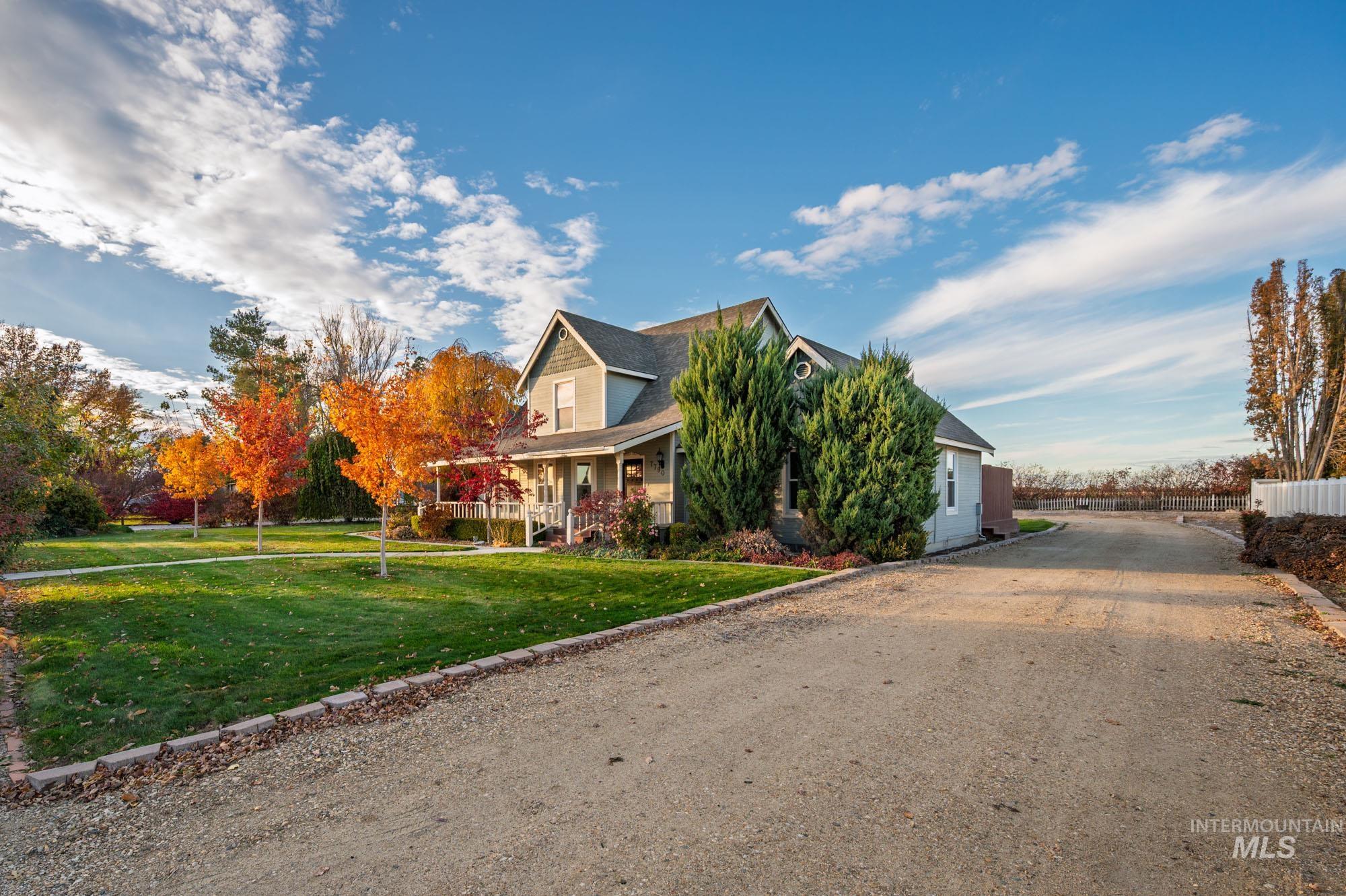7790 Ustick Road Nampa, ID 83687 - Photo 27 of 41 View of front of property with a porch