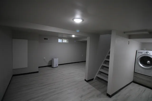 a view of a storage & utility room with washer and dryer