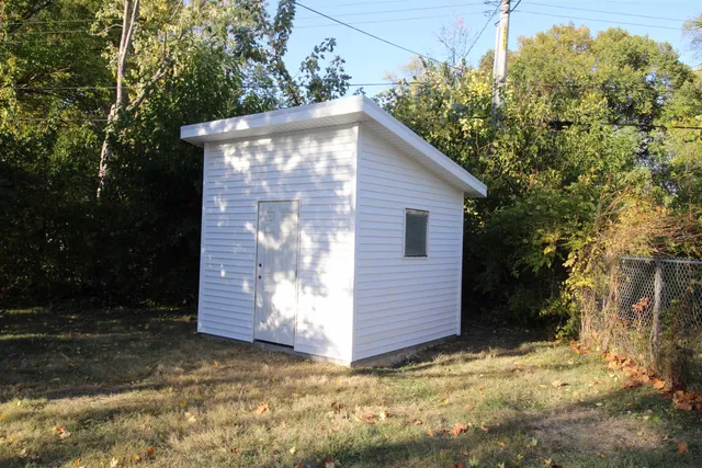 a view of backyard of house