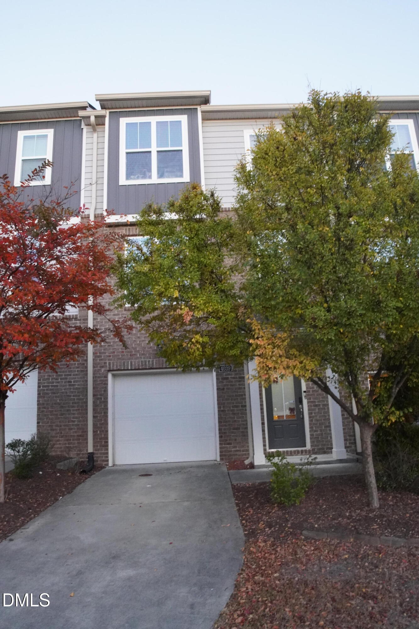 4039 Sykes Street Cary, NC 27519 - Photo 2 of 22 front view of a house with a yard