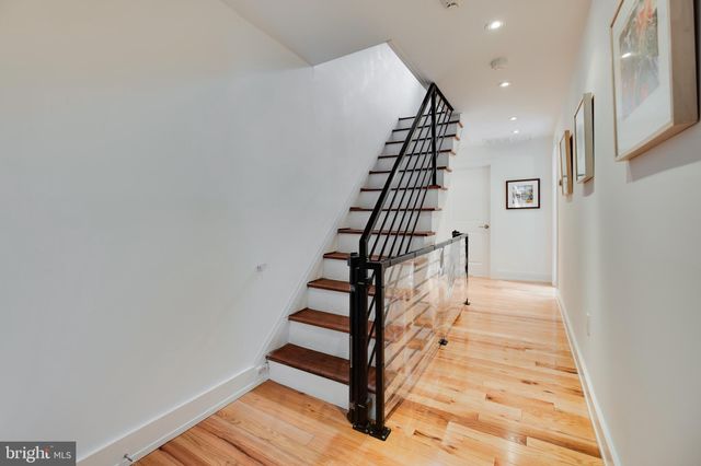 a view of entryway with wooden floor