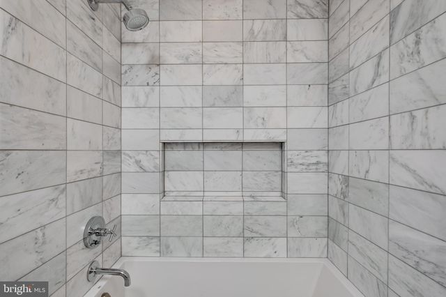 a bathroom with a bathtub