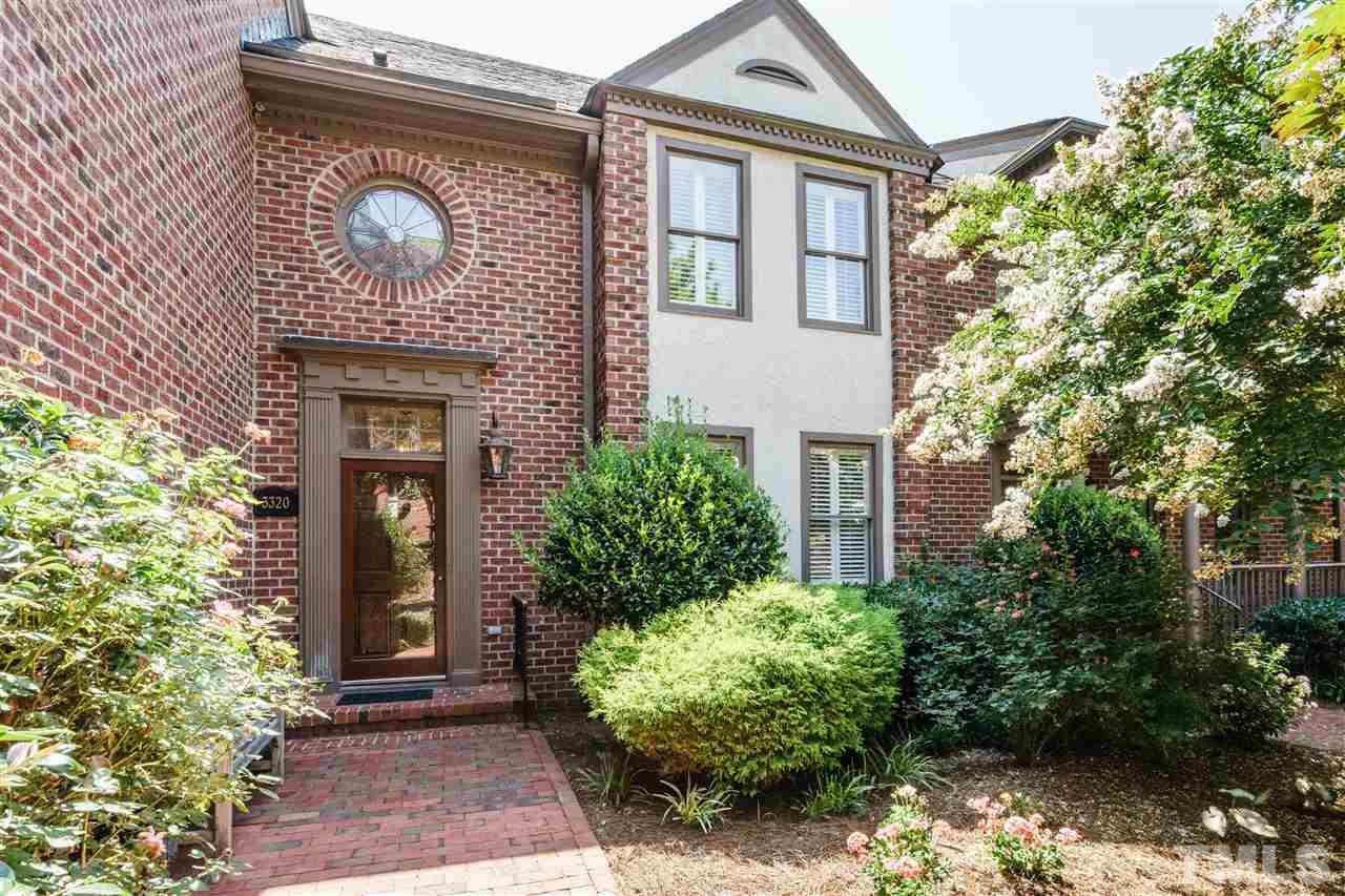 3320 Ridgecrest Court Raleigh, NC 27607 - Photo 1 of 24 a front view of a house with garden