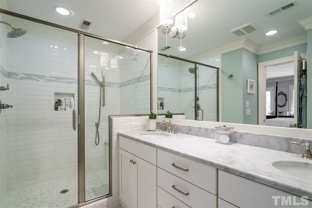 3320 Ridgecrest Court Raleigh, NC 27607 - Photo 18 of 24 a bathroom with a granite countertop sink mirror and double