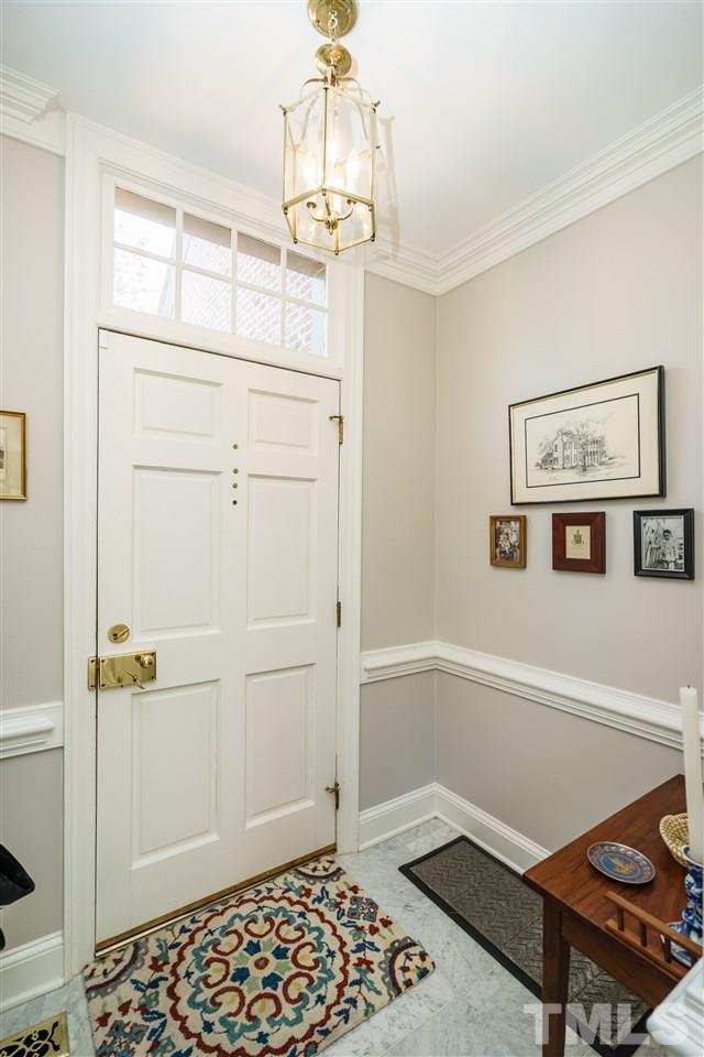3320 Ridgecrest Court Raleigh, NC 27607 - Photo 3 of 24 a view of a hallway with closet and wooden floor