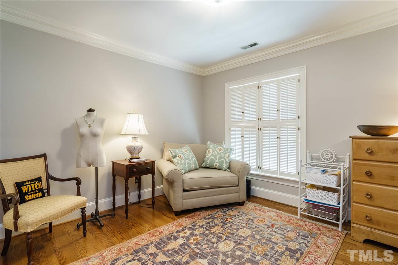 3320 Ridgecrest Court Raleigh, NC 27607 - Photo 21 of 24 a living room with furniture and a window