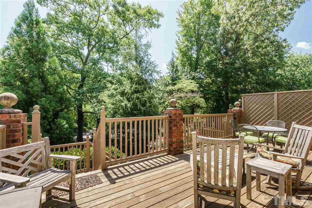 3320 Ridgecrest Court Raleigh, NC 27607 - Photo 22 of 24 a view of balcony with wooden floor and outdoor seating
