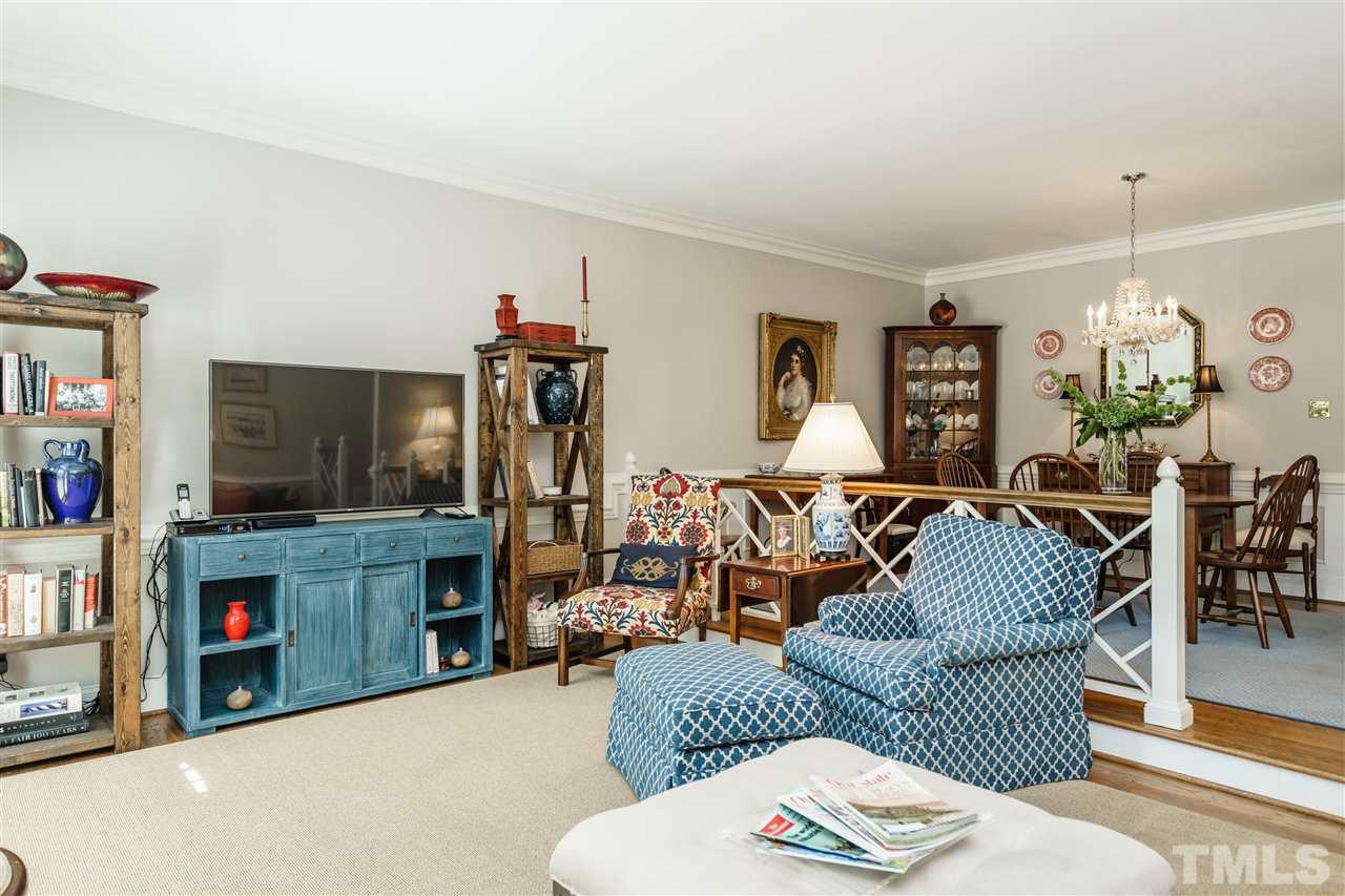 3320 Ridgecrest Court Raleigh, NC 27607 - Photo 5 of 24 a living room with furniture and a flat screen tv