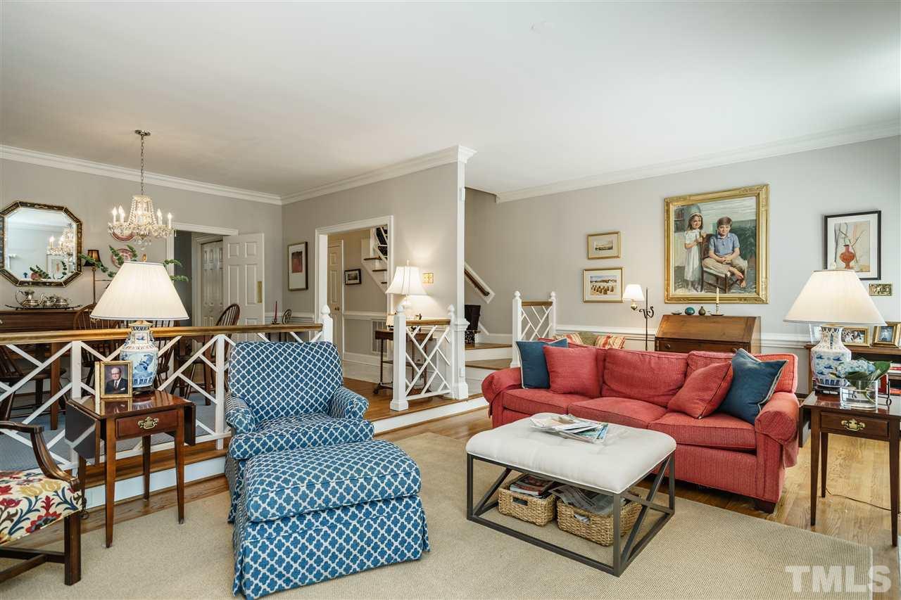 3320 Ridgecrest Court Raleigh, NC 27607 - Photo 6 of 24 a living room with furniture a rug and a window