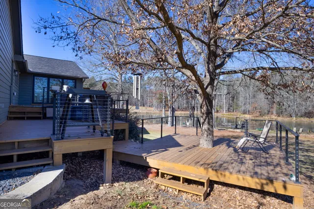 a view of a lake with a yard