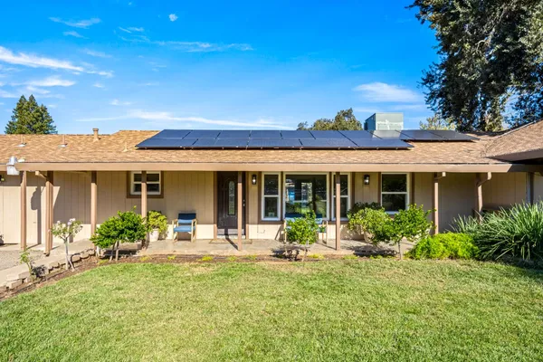 a front view of a house with a porch