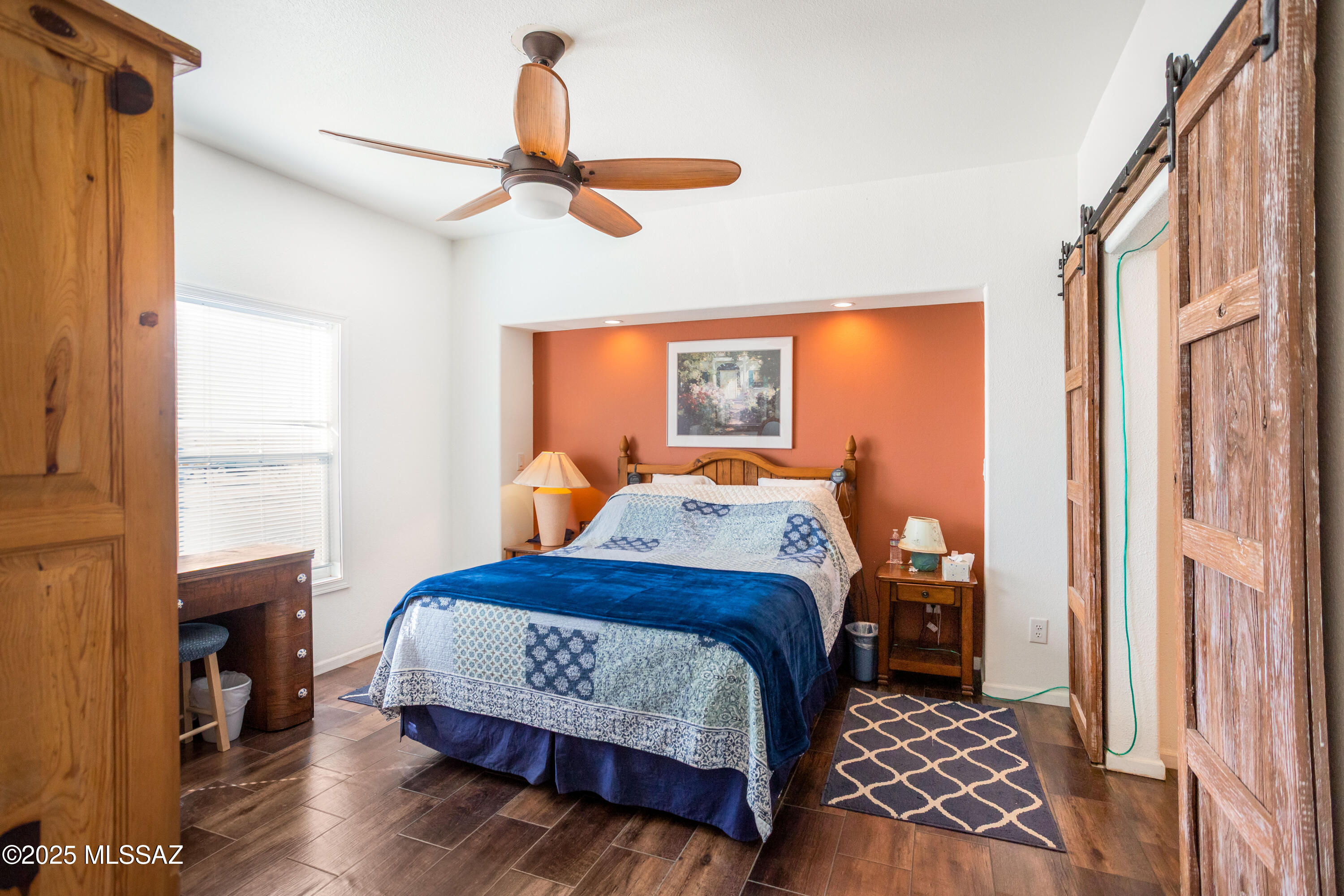 10187 North Mormon Road Elfrida, AZ 85610 - Photo 23 of 50 a bedroom with a bed and a window