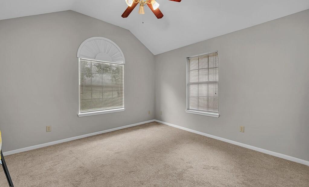 2618 South 2nd Street Waco, TX 76706 - Photo 16 of 40 an empty room with windows and fan