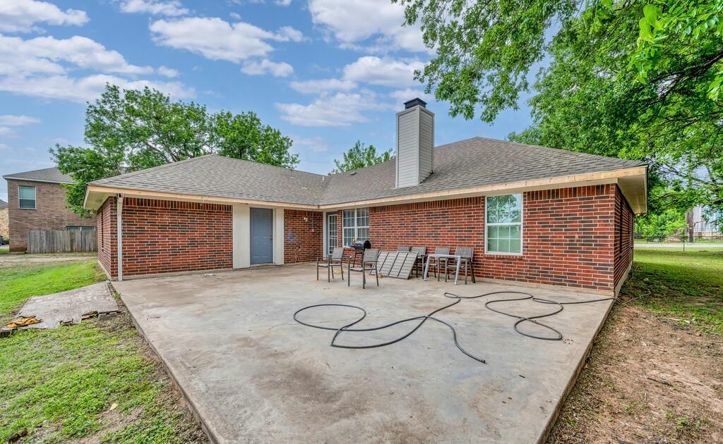2618 South 2nd Street Waco, TX 76706 - Photo 23 of 40 a view of house with backyard space and porch