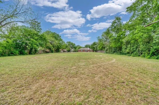 an aerial view of residential house with outdoor space