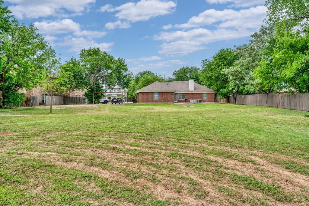 2618 South 2nd Street Waco, TX 76706 - Photo 27 of 40 a house view with a garden space